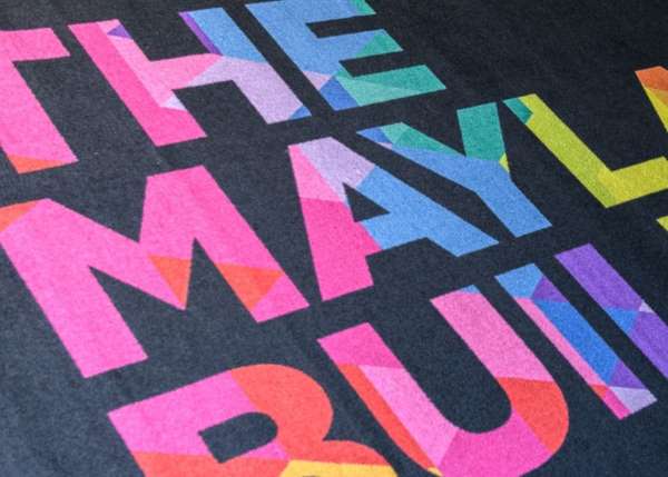 A Carpet Logo Mat with vibrant colours 